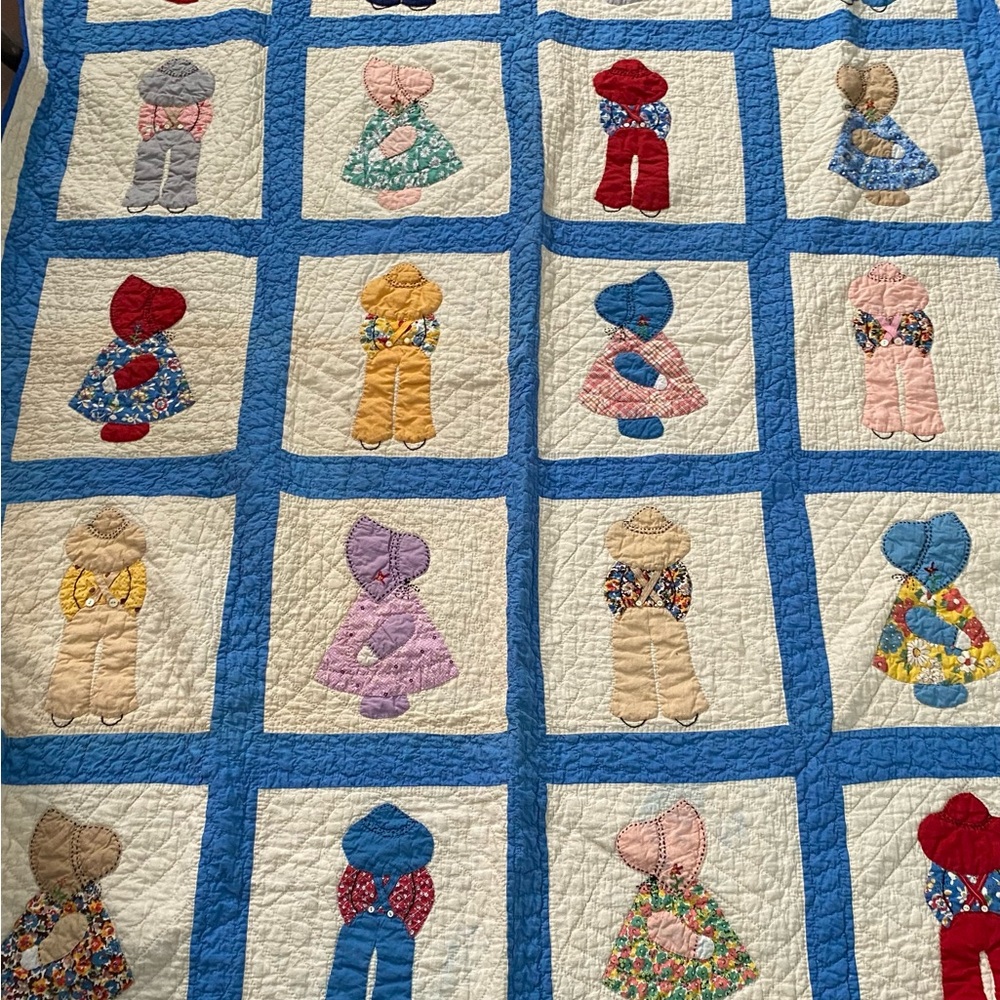Vintage Quilt with Blue and Multicolor Accents
